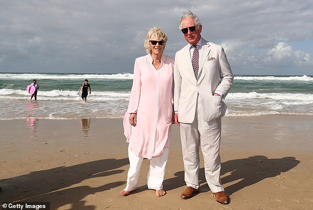 Charles and Camilla walk on Broadbeach on the Gold Coast of Australia on April 5, 2018