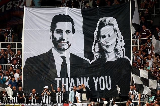 Newcastle United fans display a thank you banner to former directors Amanda Staveley and husband Mehrdad Ghodoussi