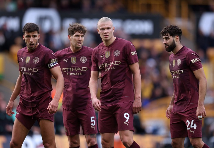 Ruben Dias, John Stones, Erling Haaland and Josko Gvardiol of Manchester City wait for a corner kick during the Premier League match between Wolver...