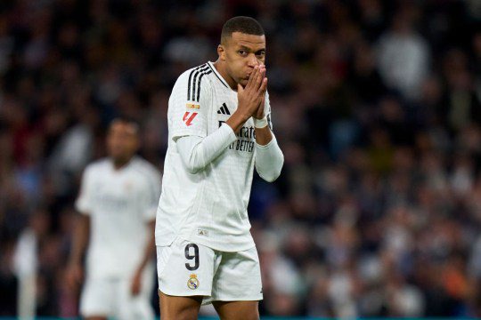 Kylian Mbappe of Real Madrid CF reacts to a missed chance during the LaLiga match between Real Madrid CF and FC Barcelona at Estadio Santiago Bernabeu