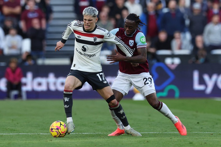 Alejandro Garnacho of Manchester United controls the ball whilst under pressure from Aaron Wan-Bissaka of West Ham United during the Premier League...