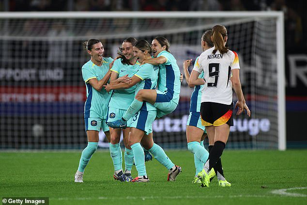 The midfielder was mobbed by her teammates after finding the back of the net