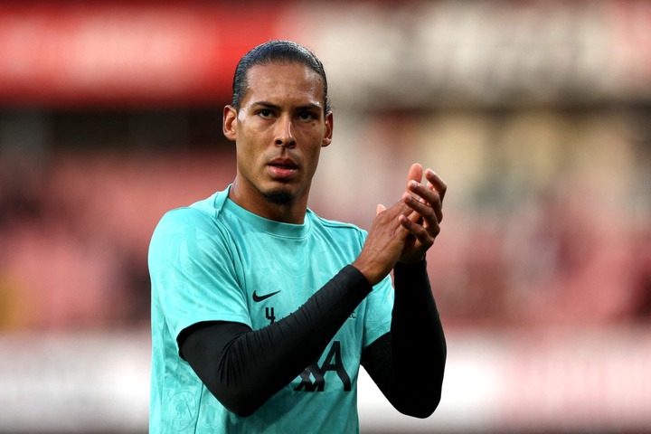 Liverpool's Dutch defender #04 Virgil van Dijk applauds the fans before the English Premier League football match between Arsenal and Liverpool at ...