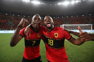 Angolans jubilate after scoring a goal against opponents