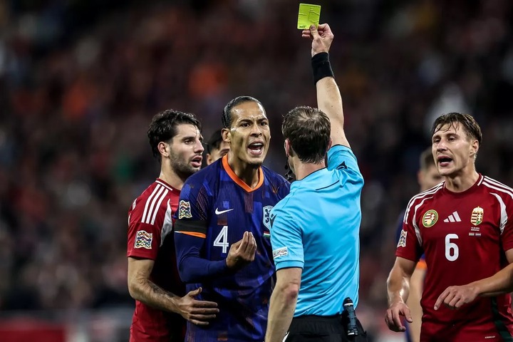 Virgil van Dijk remonstrates with the referee after being booked during the Netherlands' Nations League game against Hungary