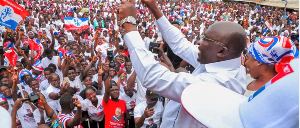 Dr Bawumia cheering on supporters during a camping rally