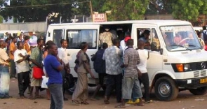 Passengers boarding a commercial vehicle