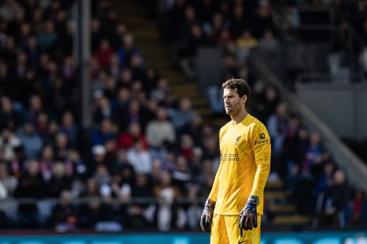  Liverpool's Alisson Becker looks on 