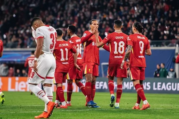 Liverpool striker Darwin Nunez celebrates with teammates.