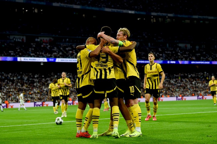 Jamie Gittens of Borussia Dortmund (front) celebrates with his teammates after scoring the 2-0 lead during the UEFA Champions League 2024/25 League...