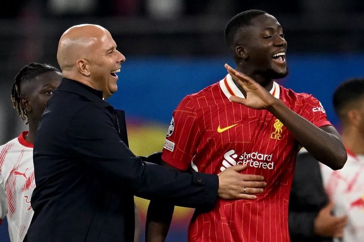 Liverpool head coach Arne Slot with Ibrahima Konate at the end of the UEFA Champions League match at RB Leipzig on October 23 2024