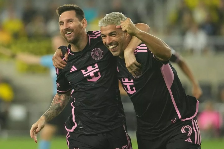 Lionel Messi #10 and Luis Suarez #9 of Inter Miami CF celebrate a goal in the second half against the Columbus Crew at Lower.com Field on October 02, 2024