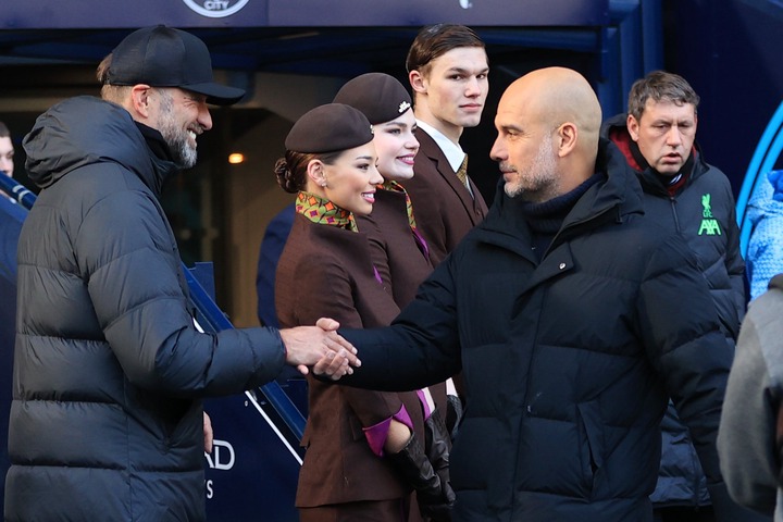 Liverpool manager Jurgen Klopp greets Manchester City manager Pep Guardiola during the Premier League match between Manchester City and Liverpool F...