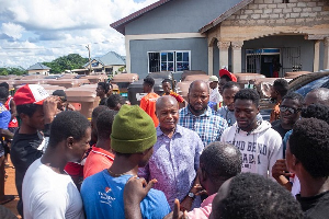 The NPP chairman engaging the 'pragya' riders in the Bono region