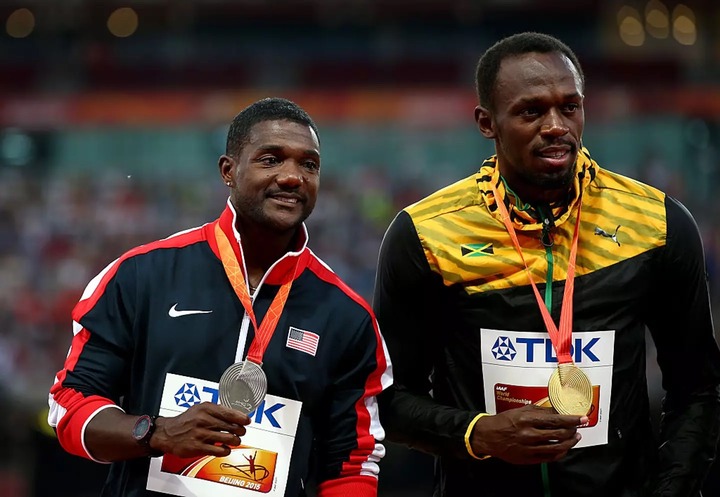 Justin Gatlin and Usain Bolt pose with their medals at the 2015 World Athletics Championships - Getty