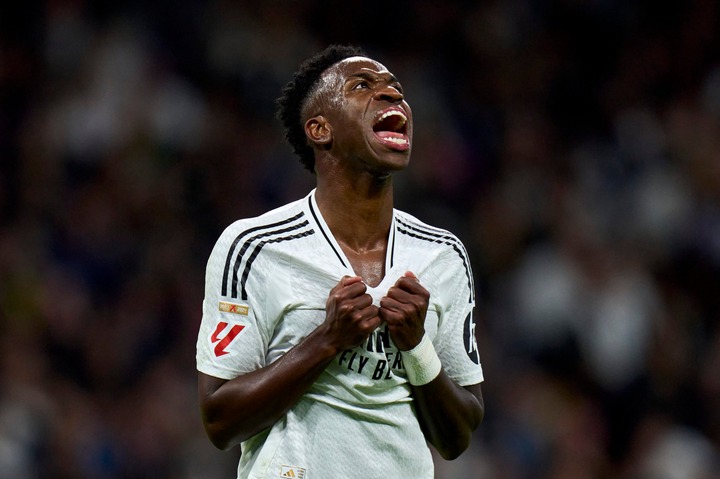 Vinicius Junior of Real Madrid CF reacts to a missed chance during the LaLiga match between Real Madrid CF and FC Barcelona at Estadio Santiago Ber...