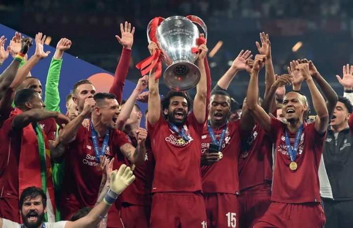 MADRID, SPAIN - JUNE 01: (THE SUN OUT, THE SUN ON SUNDAY OUT) Mohamed Salah of Liverpool lifting the UEFA Champions League trophy the UEFA Champions League Final between Tottenham Hotspur and Liverpool at Estadio Wanda Metropolitano on June 01, 2019 in Madrid, Spain. (Photo by John Powell/Liverpool FC via Getty Images)