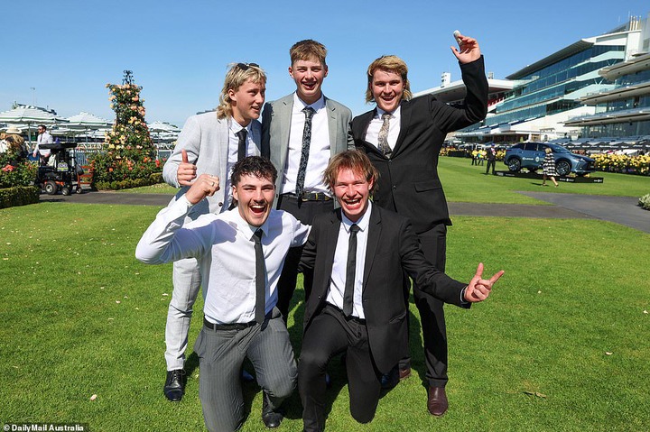 These eager revellers posed for a group photo before celebrations kicked off