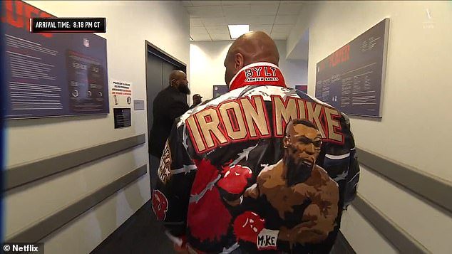 Mike Tyson sported a jacket with art work referring back to his prime