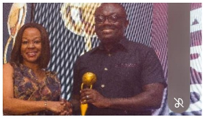 CEO of St. John’s Hospital and Fertility Centre, Dr. Maame Yaa Afriye (Left) receiving the award