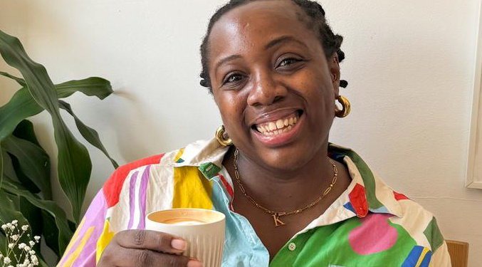 Kristabel Plummer, a 37-year-old woman holding a cup of coffee, who has never been in a serious relationship and isn't rushing to find 'The One'