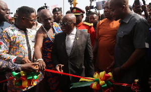 President Nana Addo Dankwa Akufo-Addo cutting the ribbon to mark the opening of the railway line