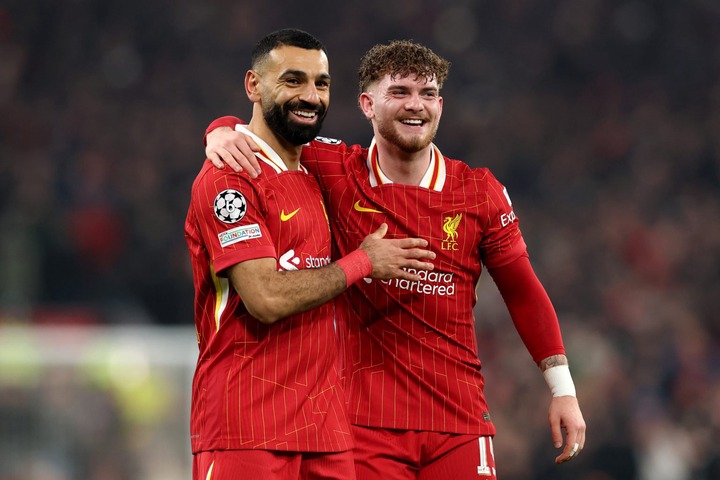 Harvey Elliott of Liverpool celebrates with teammate Mohamed Salah after scoring his team's second goal during the UEFA Champions League 2024/25 Le...