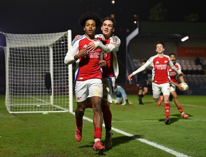 Louis Zecevic-John of Arsenal celebrates with teammate Max Dowman after scoring his team's third goal during the FA Youth Cup 5th Round match betwe...