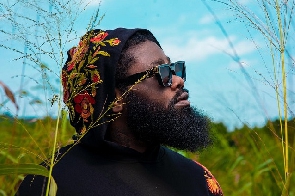 Member of music group, Captain Planet