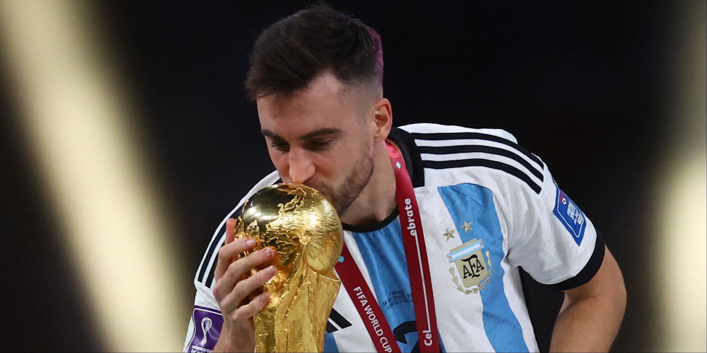 Nicolas Tagliafico with the World Cup trophy