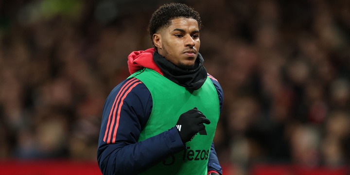 Manchester United's Marcus Rashford warms up as a substitute during the match