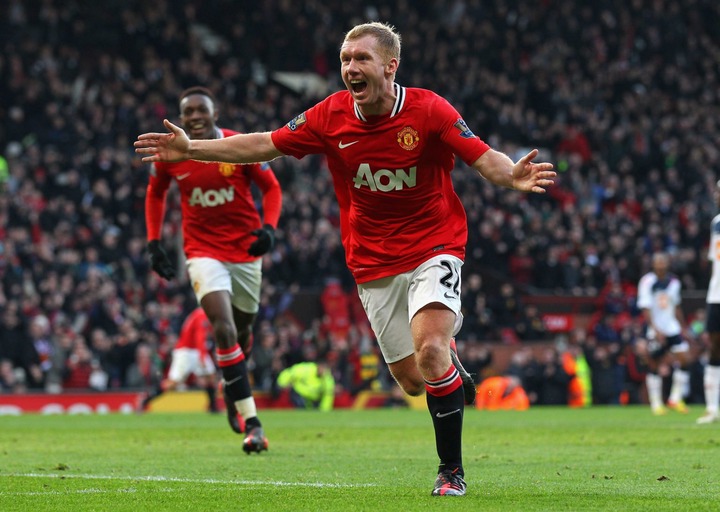 Paul Scholes of Manchester United celebrates after scoring the opening goal during the Barclays Premier League match between Manchester United and ...