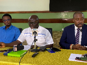 Acting Managing Director of NEDCo, John Okine Yamoah (center)