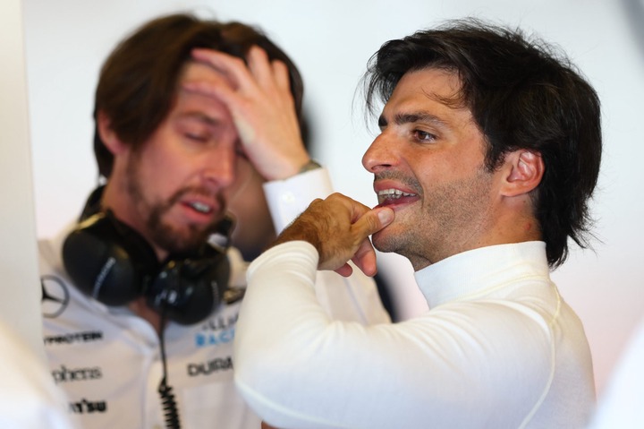 Carlos Sainz of Spain and Williams looks on in the garage during Formula 1 testing at Yas Marina Circuit on December 10, 2024 in Abu Dhabi, United ...