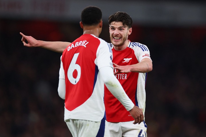 Declan Rice of Arsenal with Gabriel Magalhaes during the Premier League match between Arsenal FC and Manchester City FC at Emirates Stadium on Febr...