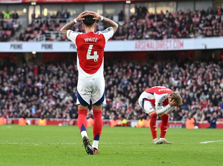 Arsenal players react after defeat against West Ham on Saturday