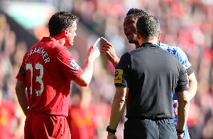 Carragher and Mikel Obi during their playing days in England