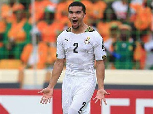 Kwesi Appiah celebrating after scoring a goal