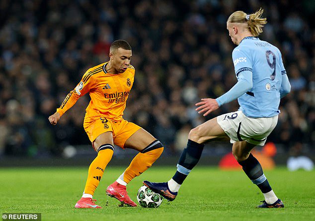 Kylian Mbappe (left) and Erling Haaland (right) shared a pitch in Manchester on Tuesday night