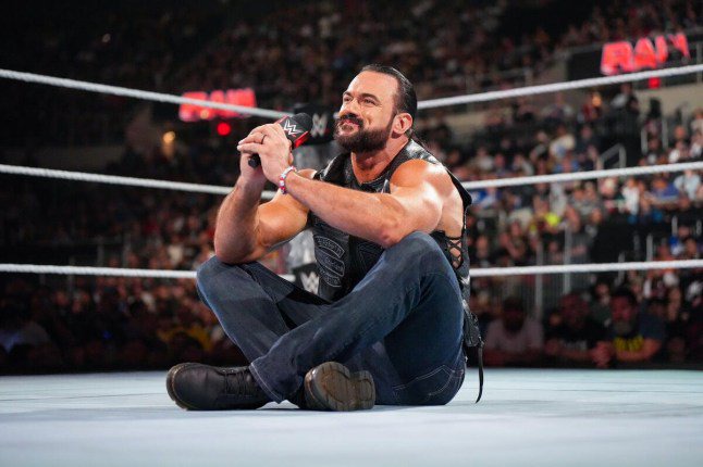 WWE superstar Drew McIntyre sits in the ring on Raw