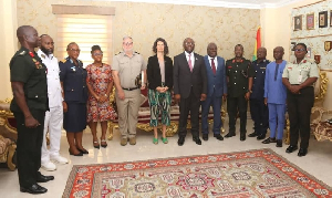 Dr Omene Boamah in a group photograph with the diplomats