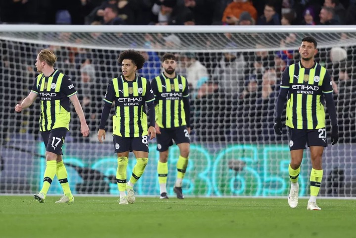 Manchester City players react after conceding