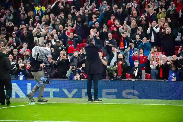 Van Nistelrooy applauds the Stretford End after United's win over Leicester in November. Image credit: Getty