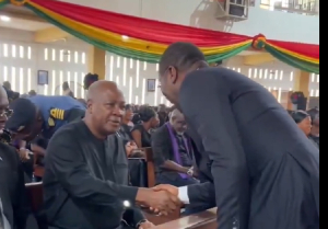 President John Dramani Mahama sharing a handshake with Afenyo-Markin