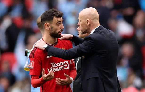 Erik ten Hag speaks to Bruno Fernandes of Manchester United during the Emirates FA Cup Semi Final match between Coventry City and Manchester United at Wembley Stadium