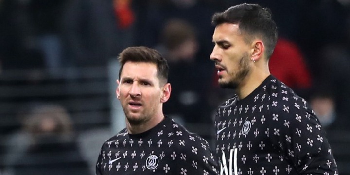 Leandro Paredes and Lionel Messi