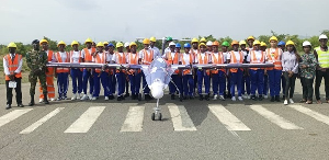 Executives and students captured in a photo with the space plane, dubbed GAF Josephine