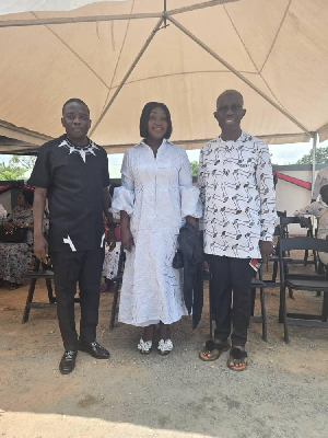 Mr and Mrs Poku-Adusei with IGP Dr George Akuffo Dampare (right)