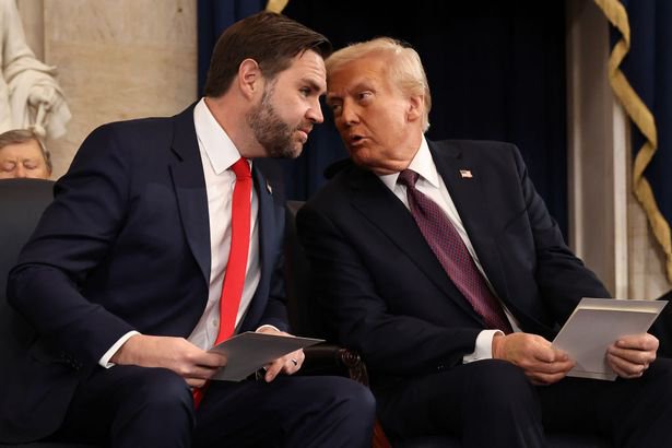 .S. Vice President-elect former Sen. J.D. Vance speaks with U.S. President-elect Donald Trump