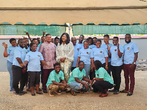 Prof Wiafe Akenteng with is staff after the day's health activities